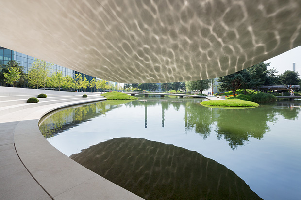 Porsche Pavillon at Autostadt Wolfsburg by Henn Architekten Porsche Pavillon at Autostadt Wolfsburg by Henn Architekten